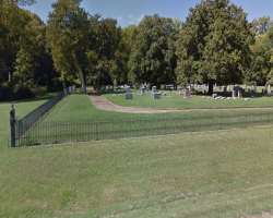 The cemetery boundaries are marked by iron fencing The cemetery boundaries are marked by iron fencing.